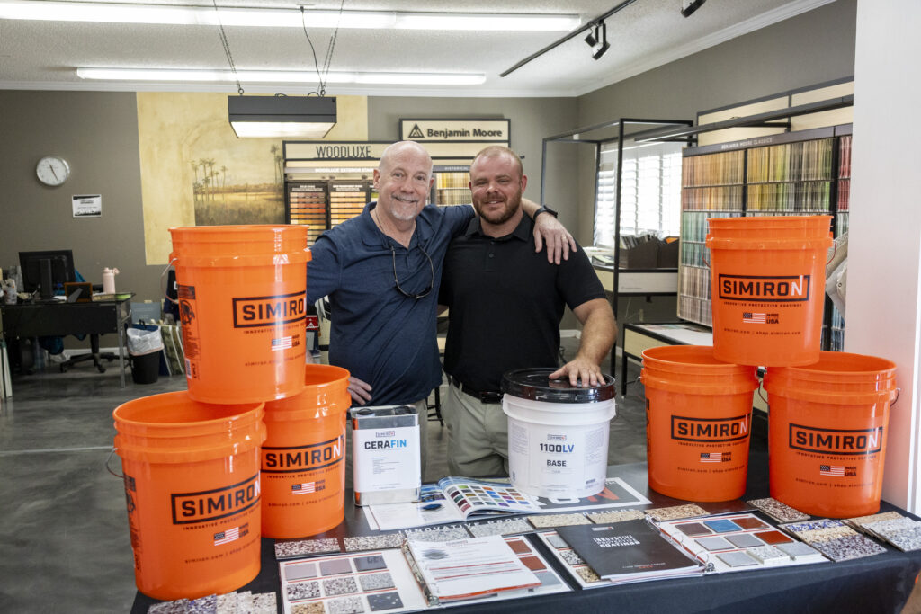 team showing off Simiron Products