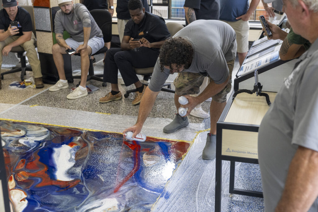 man participating in contractor rewards program workshop for epoxy flooring installation